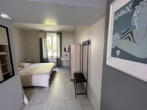 A modern and comfortably furnished apartment in Contrexéville, set in a green environment - Image 5