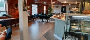 KWE Café & Auberge - Image 3