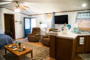 Lake front retreat, covered boat dock, large deck, fenced play area, RV parking - Image 5
