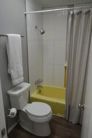 Close to the beach and shops; fast wifi - as about flexible check in and outs!  - Image 3