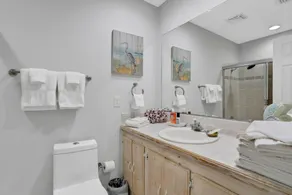 Gorgeous coastal getaway with large yard, firepit, & screened porch - Image 3