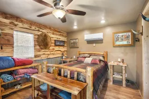 The Desperado Inn is a charming secluded cabin with Mountain Fork River access - Image 3
