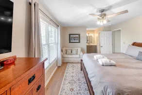 Three-story lakefront home w/ covered boat slip, and tennis/pickleball access - Image 5