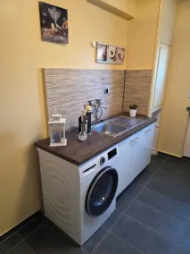 Bright and modern apartment on the ground floor in the center - Image 2