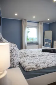 Moderne Wohnung im Grünen mit privatem Garten - Image 5