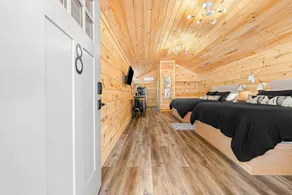 Cabin #8: Studio style layout with kitchenette and a large gravel parking pad beside the cabin for easy boat or trailer storage. - Image 5