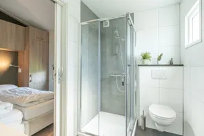You are guaranteed to unwind and relax in one of the chairs or on the comfy sofa in the central livi - Image 2