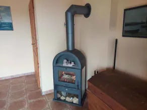 Holiday home with wood-burning stove, terrace, and view of nature - Image 3