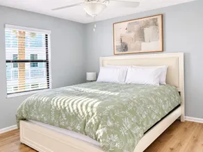 Bright 2-bed, 1-bath condo in the heart of Indian Rocks Beach, just a 2-min walk to the sand and steps from local cafés & shops. Enjoy a shared POOL, private balcony, washer/dryer, free parking — ideal for couples, friends, families & pet-friendly! - Image 5