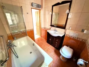 Lovely three-bedroom villa with a serene garden, offering privacy and comfort. - Image 2