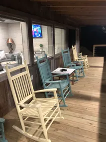 Cabin with 40 ft porch overlooking a pond. - Image 2