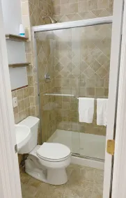 Cozy king suite with kitchen and dining area. - Image 3