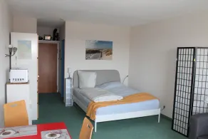 This 30 m&sup2; vacation apartment (west-facing) is located on the 6th floor of the Kiel building. A double bed and two sleeper chairs can accommodate up to 4 people. . <br><br>The built-in kitchen is fully equipped for self-catering. The cozy one. - Image 3