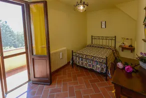 Villa in a hilly area surrounded by greenery with swimming pool and breathtaking views - Image 5