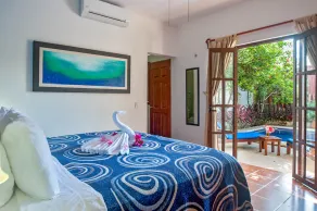 Relax by the sparkling pool and enjoy the ocean breeze. - Image 4