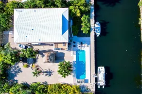 Tropical Oasis with Beautiful Home, Pool, Dock and Tiki Hut - Image 4