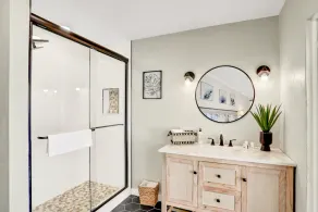 Updated home across from beach with covered balcony, central AC, & washer/dryer - Image 4