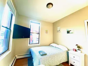 Modern & Sunny FamFriendly 2BR Home, 1 stop to NYC - Image 3