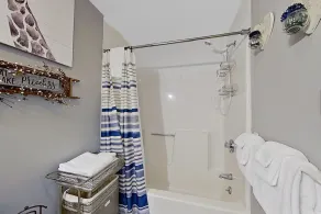 Lakeside condo with beach/water access, pool & sports courts - Image 3