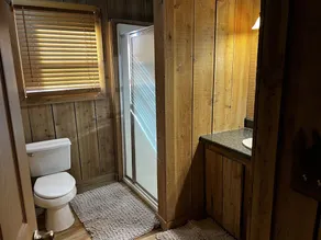 Cabin with hot tub, fire pit, and fishing pond. - Image 5