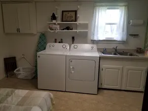 Open concept 2 bedroom ranch with attached garage and deck - Image 2
