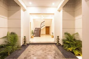 ELIVAAS Signature Mandovar Mountain Valley Retreat Pet-friendly Suite Room with Shared Pool, Garden, Restaurant & Hill Views - Image 2