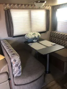 RV in foothills located near stores. Smoking area with fire pit provided. - Image 5