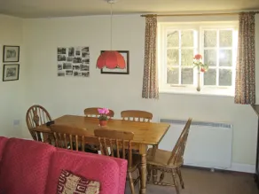 Situated by the banks of a river with private fishing just yards away. - Image 4
