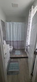 Cozy bedroom with private bathroom, and separate, direct access entrance. - Image 2