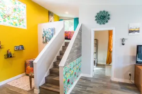 Vibrant Bohemian Loft Apartment with Shared Pool, Garden & Colorful Murals - Image 2