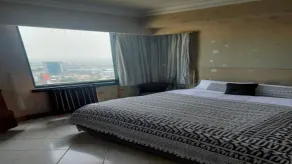 Live comfortably and stylishly in a modern 2-bedroom apartment at Taman Anggrek. - Image 3