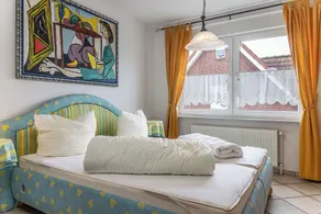 Away from the hustle and bustle of the coastal resorts, they can stay in this friendly upstairs residence - Image 4