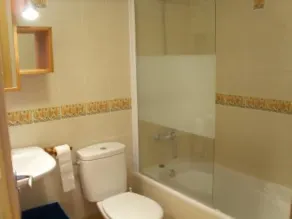 Appartement - El CampelloImmeuble de standing.Un appartement vue une mer. La Costa Blanca. Une piscine. Un golf. Un parking. Gym. Sauna. Une terrasse - Image 5