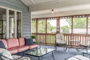 Waterfront home with swimming pool and tennis court. - Image 4