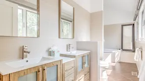 Head out East and live the good life in this renovated wooded oasis! - Image 3