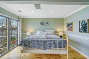 Lakefront home with private hot tub, WiFi, fun rec room, & beach area - Image 5