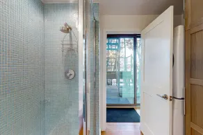 Lakefront contemporary gem with decks, lake views & pebble beach - Image 3