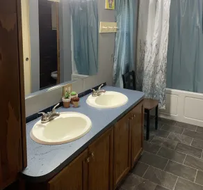 5 bdrm, 3 full bth, large living room and fireplace area.  - Image 2