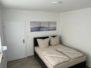 A modern renovated apartment with balcony terrace. - Image 2