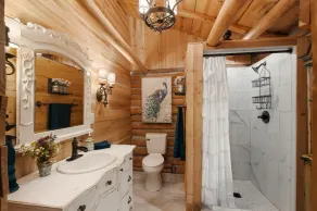 King-Delicately decorated-Log cabin charm-Front porch living-The Pampered Peacock - Image 2