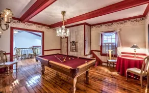 Kitchen, billiard and sun rooms. Walking distance to Main St. downtown. - Image 4