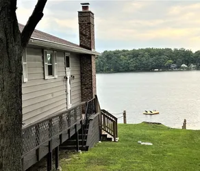 Relax Lakefront-Stunning Lake Views in Popular Sister Lakes! Private Sand Beach! - Image 2