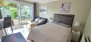 FABULOUS GARDEN  APARTMENT SHORT WALK FROM FANTASTIC BEACH - Image 2