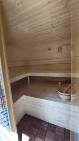 Wellness bungalow for 12 people with a private sauna and forest views. - Image 2