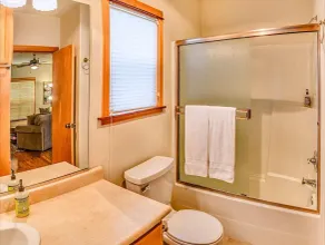 2-story, 3 bedroom modern home with king and queen beds, living room and kitchen. - Image 2