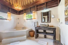 Deluxe Room with Balcony and Ocean View | The Village of Angels Resort - Image 5