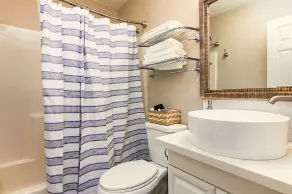Cozy 2BR/2BA retreat blending vintage charm with modern comfort. Unwind on the private sunset porch, enjoy easy Guadalupe River access, and explore nearby Gruene and Schlitterbahn for the perfect relaxing getaway. - Image 4