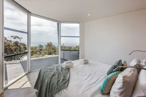 PANORAMIC VISTAS OF THE PRISTINE COASTLINE & TURQUOISE WATERS OF EAGLE BAY. - Image 5