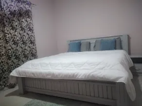 NEAT BEDROOM APARTMENT with A/C, TV shared bathroom and kitchen - Image 3