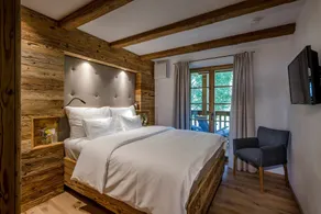 Bergwiesen-chalet-suite 80qm, 2 Schlafzimmer, Wohnraum mit Küche, Kamin und Bad mit Sauna, Balkon mit Whirlpool - Image 3